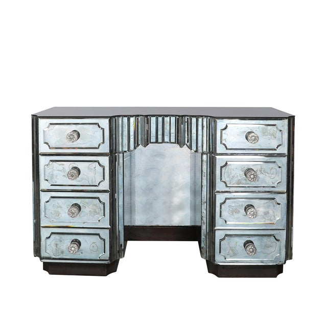 This elegant Art Deco Smoked Beveled Mirrored Vanity with Silvered Bronze Pulls originated in the United States, circa...