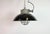Industrial hanging lamp manufactured by Elektrosvit in former Czechoslovakia during the 1960s. It features a black enamel...