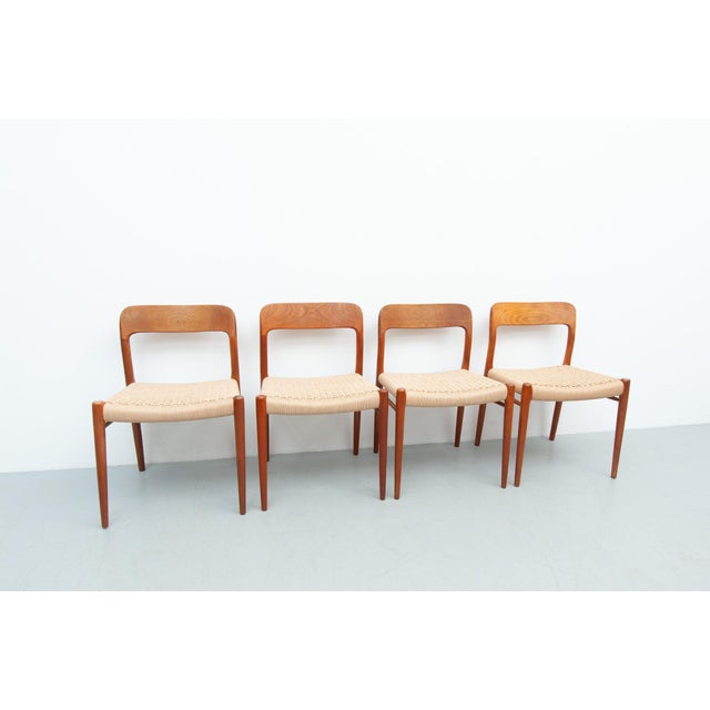 Set of four dining chairs, model 75, made of solid teak, designed by niels otto møller (1920–1982) for j. L. Møller...