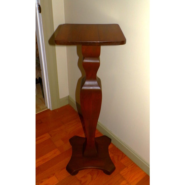 Vintage Solid Wood Pedestal Plant Fern Bust Stand features long vasiform column resting on sculptural base with curved...