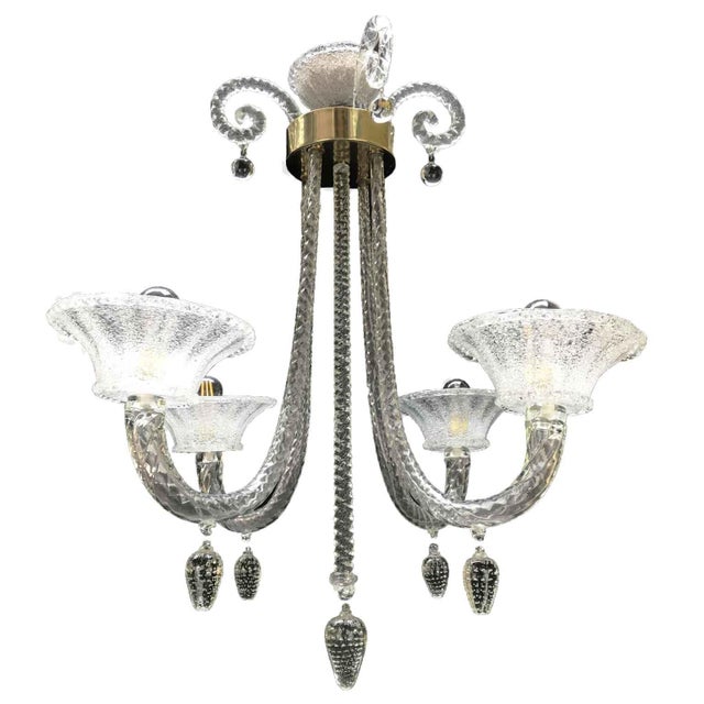 A 1940s blown glass chandelier with four e14 bulbs contained within four large glass bowls, each with an upward-facing...
