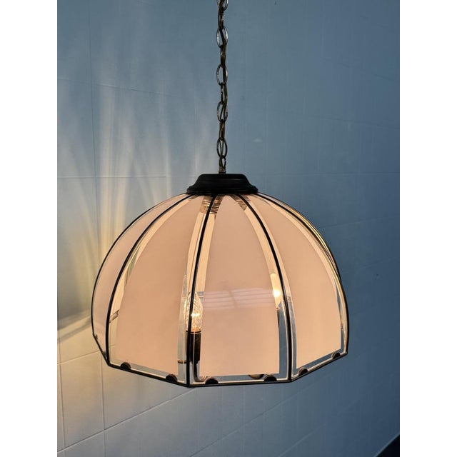 Large chandelier with a 1960s dome design, ideal for use in the living room or above the dining table. Brass-plated metal...