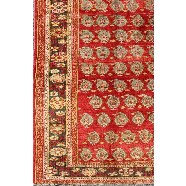 Mid 20th Century Vintage Turkish Oushak Rug in Rich Red With Allover Floral Rosette Pattern For Sale - Image 5 of 8