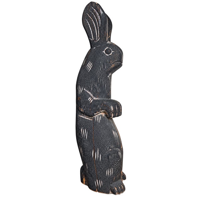 Wonderful oversized primitive folk art rabbit, hand-carved from what appears to be solid pine and standing an impressive...