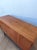 A modernist long sideboard of the 1970s. A simple, minimalist sideboard. Capacious. Drawers and shelves. Original...