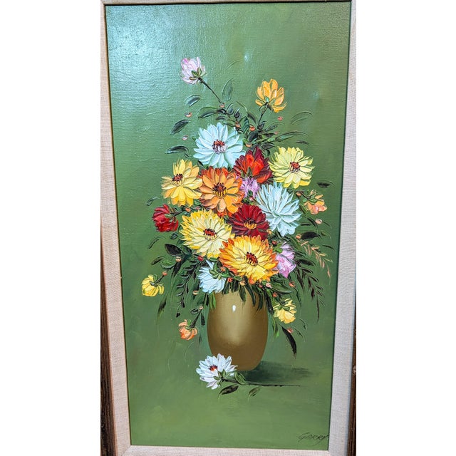 Bring classic mid-century charm into your interior space with this striking vintage floral still life oil painting on...
