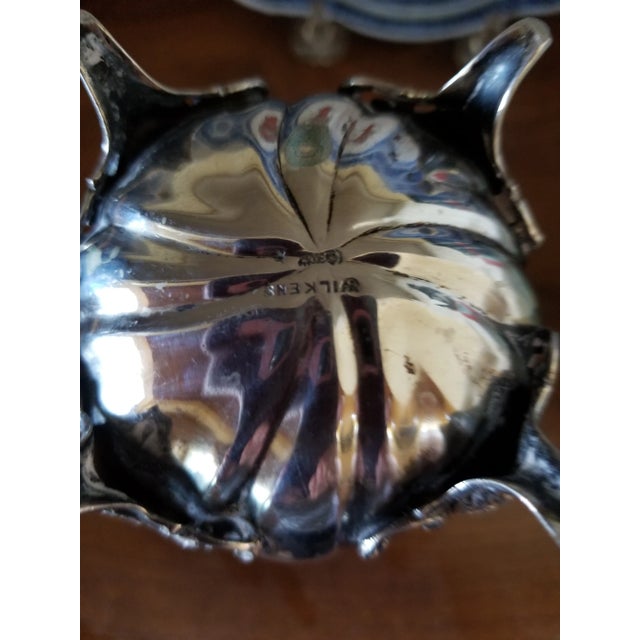 Beautiful little solid European silver rococo style creamer or small pitcher. Lots of detailed silver work with footed...