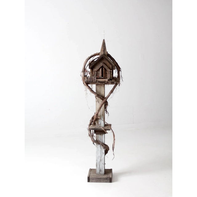 This hand-crafted vintage folk art tree house looks like a little church in the forest! Its rustic stain glassed windows,...