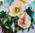 This artwork features a vibrant bouquet of flowers, captured in a glass vase, with a background that contrasts softly...