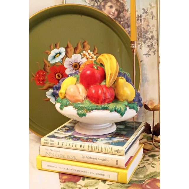 This vintage ceramic centerpiece features a charming, hand-painted mountain of realistic country orchard fruits spilling...
