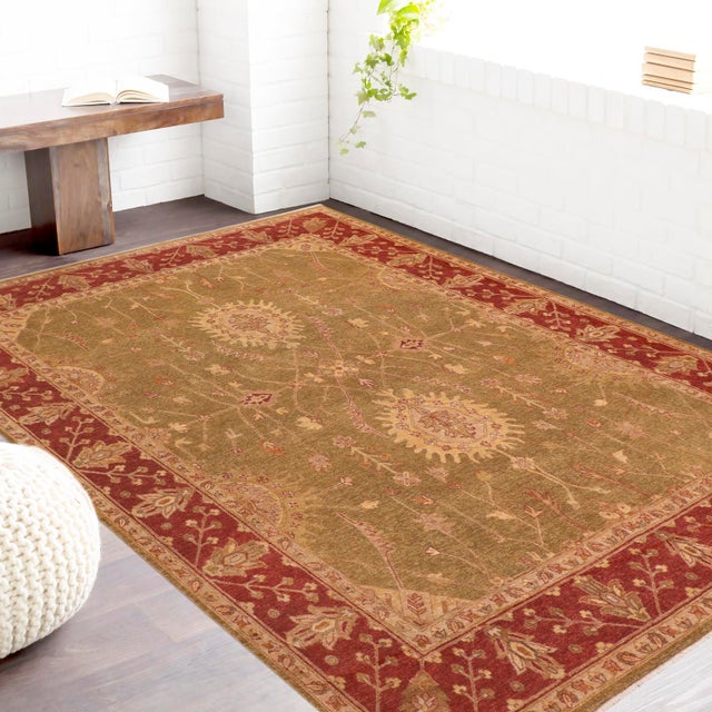 "Enhance the ambiance of your home with this magnificent Persian-influenced Turkish hand-knotted rug made by skilled...