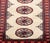 Persian Turkmen Bokhara Wool Prayer Rug, with gul motif in red and beige with fringe on the short sides. 3' 5" L x 2' 1"...