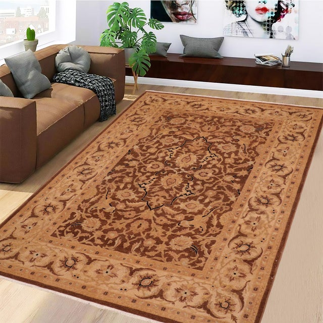 "Enhance the ambiance of your home with this magnificent Persian-influenced Turkish hand-knotted rug made by skilled...