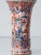 An early 20th-century French faience vase, hand-painted and mounted as a table lamp, worked in the rare cashmere palette —...