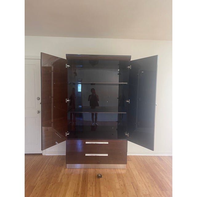 This magnificent armoire is part of the 5th Avenue Collection designed by prolific Italian interior designer Giorgio...