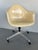 This is a vintage Charles Eames for Herman Miller, Model DAT1, fiberglass shell rolling armchair. This wonderful survivor...