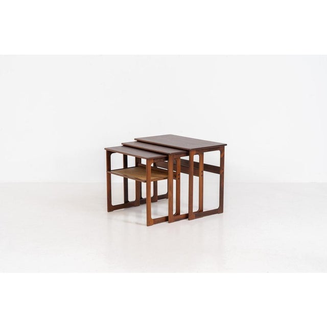 “Model 219” nesting tables by Johannes Andersen & Illum Wickelso for CFC Silkeborg (Denmark, 1960s). These tables are...