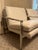 Pair of white leather, chrome structure lounge chairs designed by Milo Baughman. In good overall condition, with minor...