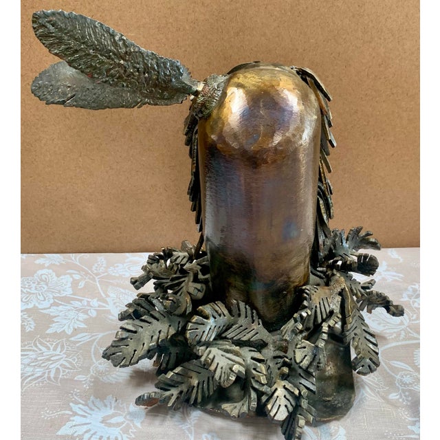A commanding and heavy-scale Brutalist sculpture of a Kachina figure, meticulously handcrafted from a collage of welded...