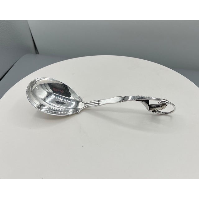 Georg Jensen Sterling Silver Serving Spoon For over a century, Georg Jensen has produced some of the finest objects in...