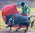 When in Madrid by Sheri Farabaugh | Oil on Hardboard Bullfighter with a bull in a bullring. For Sale