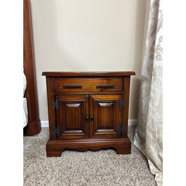 Timeless and sturdy, this pair of vintage solid wood nightstands has been freshly refinished in a rich Minwax Red Mahogany...