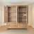 A beautiful oversized antique English pine linen press offering an incredible amount of storage while retaining the warmth...