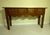 Bring authentic warmth and historic character into your home with this magnificent antique country console table....