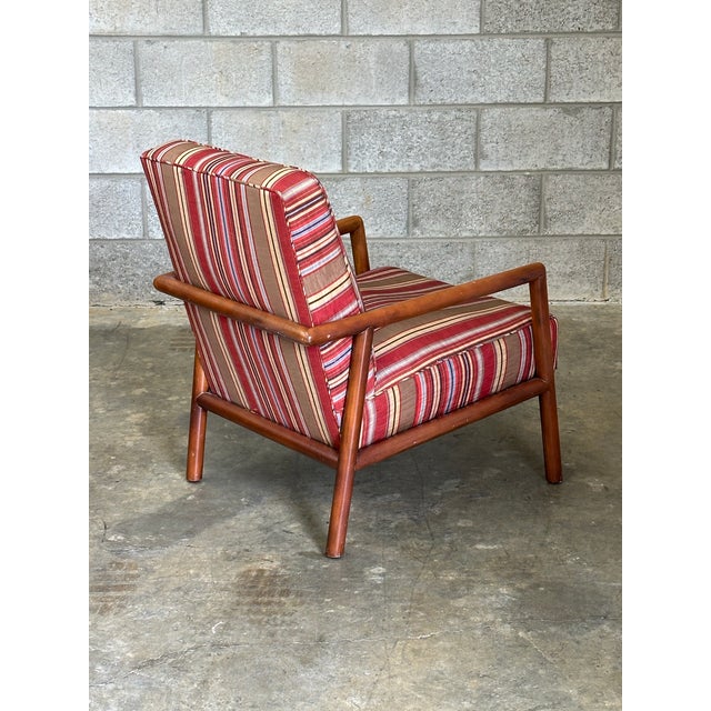 Great lounge or accent chair by T.H. Robsjohn-Gibbings for Widdicomb. Chair was reupholstered at some point and as such no...