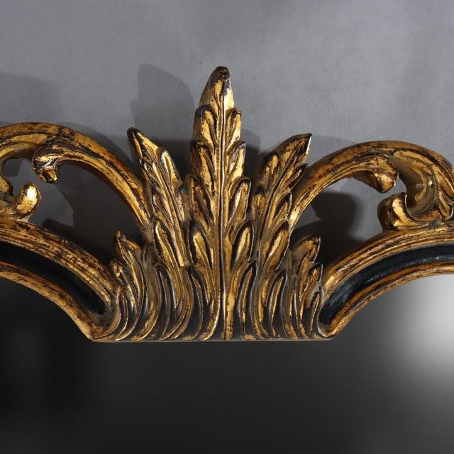 French Louis XVI Style Ebonized & Gilt Mirror with Stylized Arch Form having Foliate Elements 20thC Measures - 42" x 27...