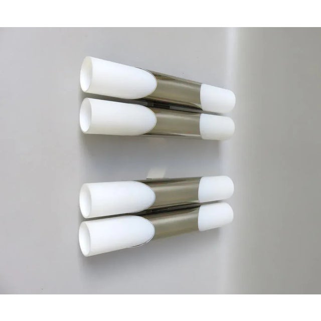 Noble pair of wall lights from the 60s, neuhaus lights, made of nickel-plated brass and 8 cylindrical lampshades made of...