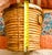 This is a mid-century modern Italian coiled rattan and brass basket with handles. Handcrafted in Italy, typically during...