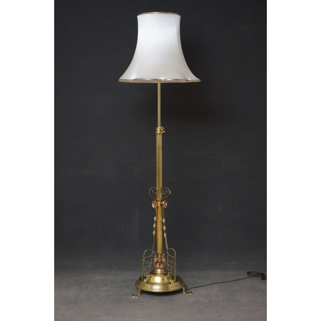 Superb Late Victorian / Art Nouveau brass and copper height adjustable standard lamp, having reeded column with twisted...