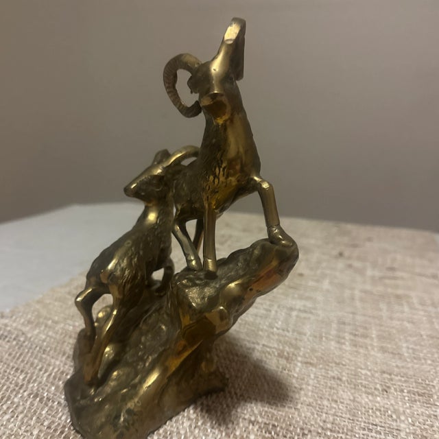 Crafted in solid brass with a warm, natural patina, this piece blends mid-century modern aesthetics with a touch of...