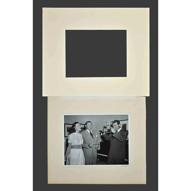 Mrs. Red Skelton Poses is an original b/w photograph about Hollywood in the 1940s, realized by De Wan Studios. On the back...