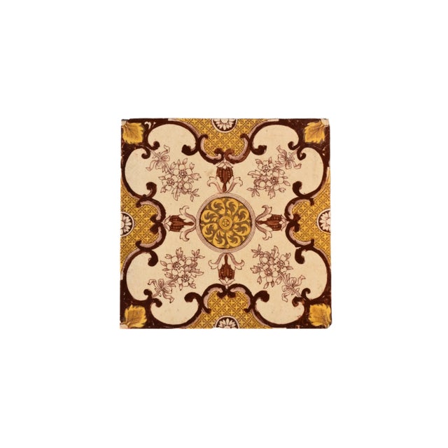 MINTON VICTORIAN TRANSFER-PRINTED TILE Era: Late 19th Century Style: Aesthetic Movement OVERVIEW: A decorative Victorian-...