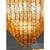Elegant luxury flush mount made in amber-rosè murano glass “squared” elements. “squared ” are blown inside a wooden mold,...