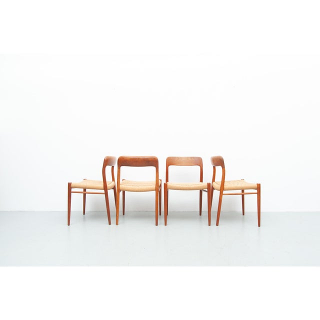 Four dining chairs, model 75, made of solid teak. A classic design by niels otto møller, manufactured by j. L. Møller...