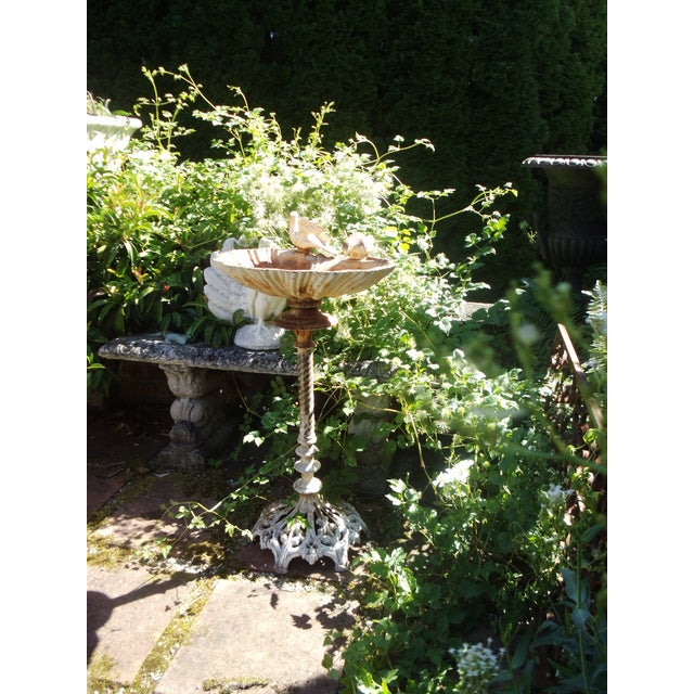 A beautiful patina, solid cast iron, and decorative details make it perfect for adding romantic charm to any corner. It...