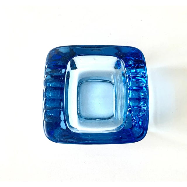 Beautiful vintage sky blue modern square shaped tall pressed glass ashtray found in Europe. Two sides have cuts for...