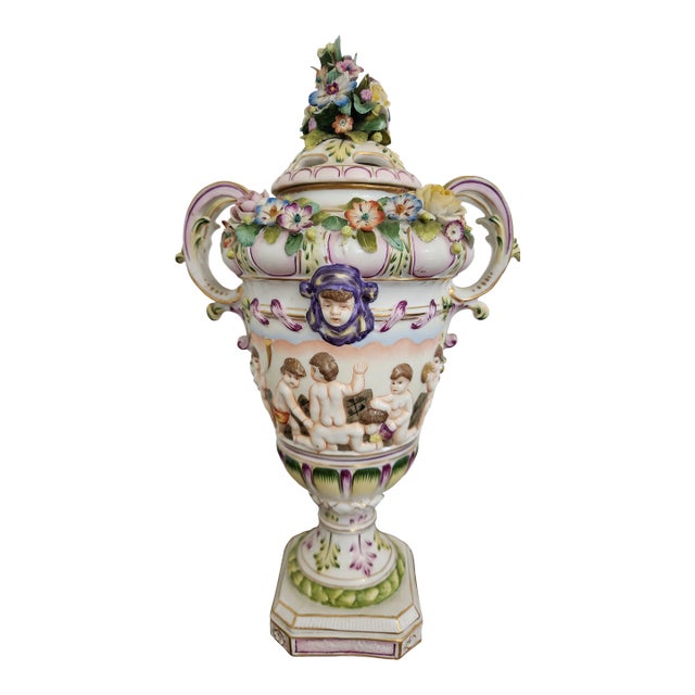 Circa 1900 Vienna-Style Porcelain Potpourri Urn With Applied Flowers, Putti & Blue Shield Mark For Sale