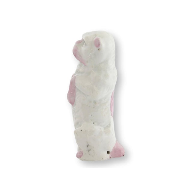 Charming nineteenth century porcelain pug modeled in the beloved begging pose that every pug owner knows so well. Full of...
