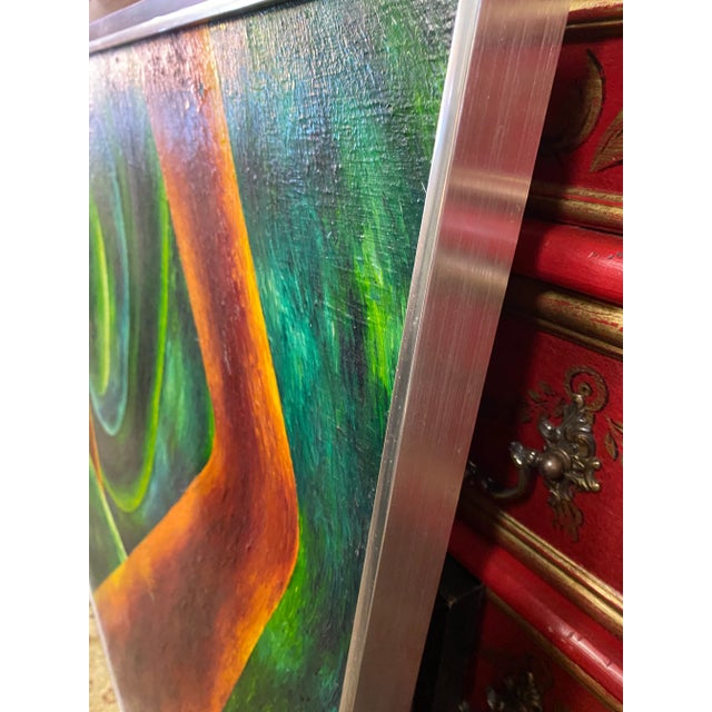 Large painting framed in a vintage metal frame . Painting was once owned by an older couple now in their late 80's who...