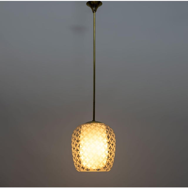 "Cora" pendant lamp, Mid-Century Modern, extremely rare and elegant. Designed by the famous German artist Wilhelm...