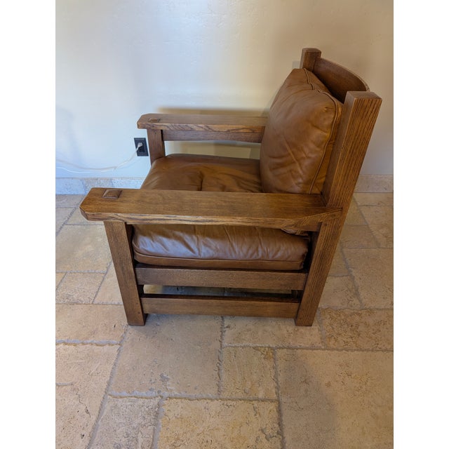 A favorite of Gustav Stickley, The Eastwood Chair and ottoman is one of the most sought after pieces by collectors and...