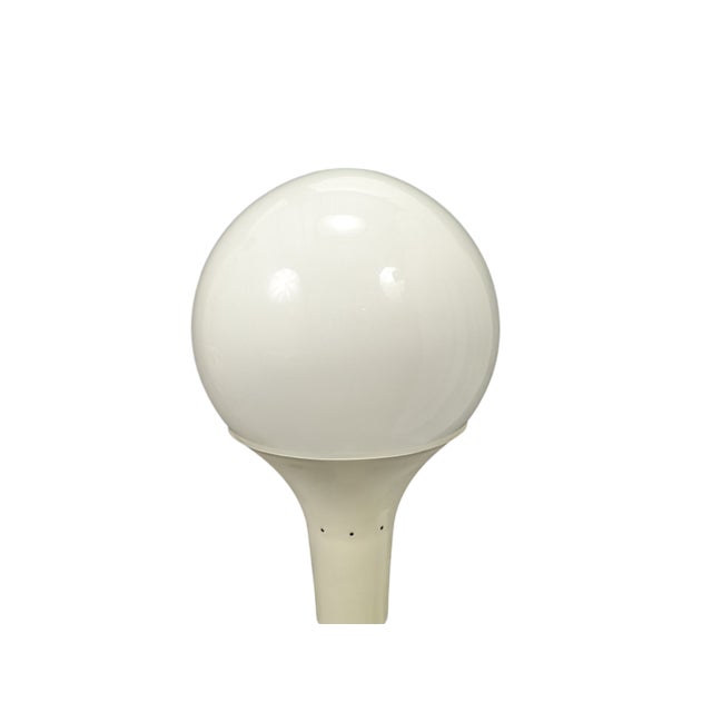 Vintage floor lamp with upper sphere in Murano glass and metal base. The conditions are excellent, small signs of aging on...