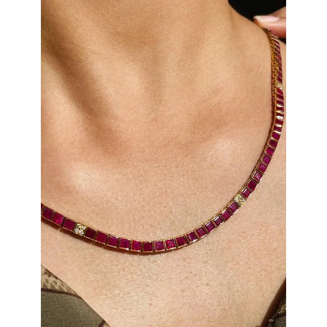 This is part of Chairish’s Fine Jewelry assortment. Ruby Necklace in 18K Gold studded with square cut ruby pieces and...