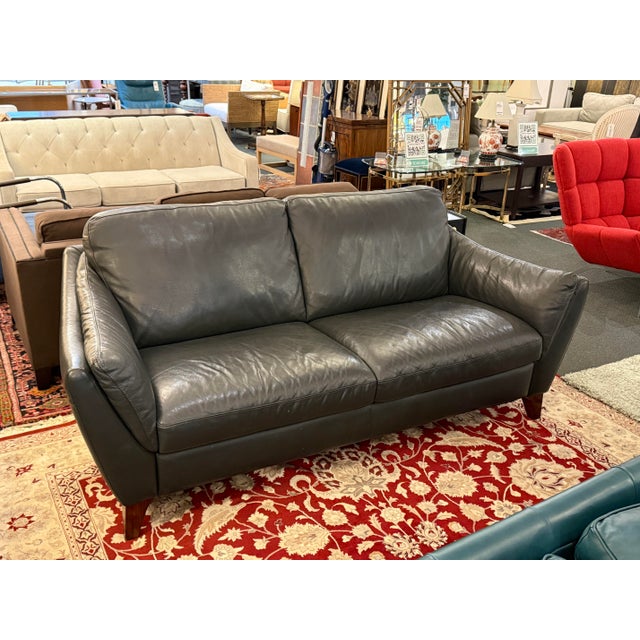 Design Plus Gallery presents the Greccio Leather Sofa from Natuzzi Editions Collection. The sofa is a nice black leather...