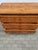 A very elegant and beautifully shaped chest of drawers in lovely cherry veneer, with 3 drawers with locks and 3 keys. It...
