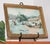 This is a stunning antique watercolor painting of what appears to be an African American woman hanging laundry. The use of...